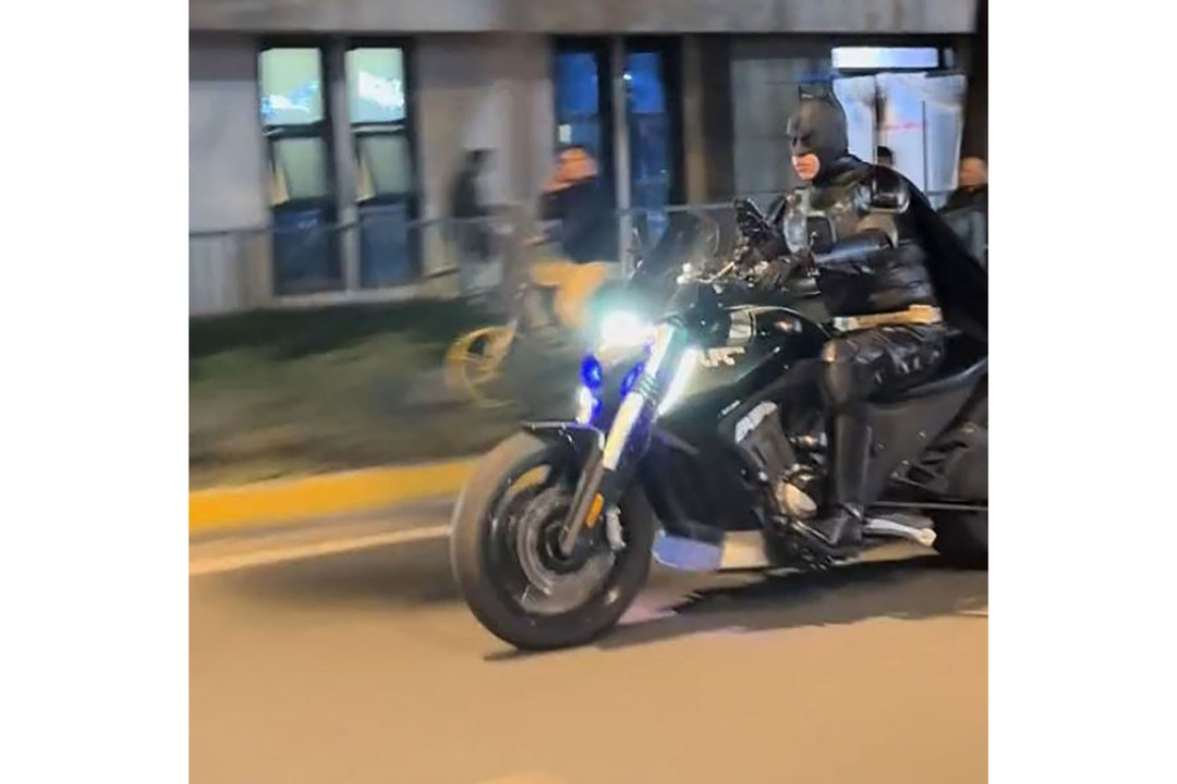 A biker dressed as Batman was pulled over by traffic cops