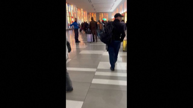 Passengers evacuate New York airport following reports of a suspicious package