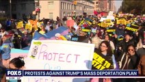 Migrants march New York streets in Trump protest clutching ‘here to stay’ signs
