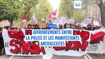 Affrontements entre police anti-émeute et manifestants lors d'une marche antifasciste à Bologne