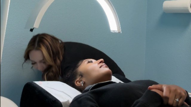 Girl tries to scare client with a mask but client scares her instead