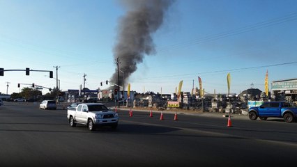 Huge plumes of smoke visible for miles after east Bakersfield warehouses catch fire