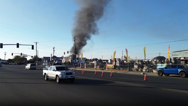 Huge plumes of smoke visible for miles after east Bakersfield warehouses catch fire
