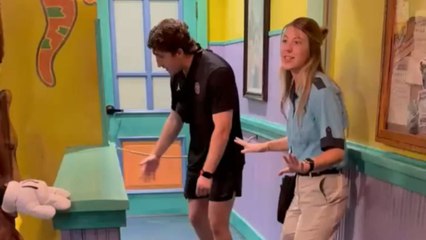 Little girl meets Mickey and Minnie Mouse for the first time and hugs them