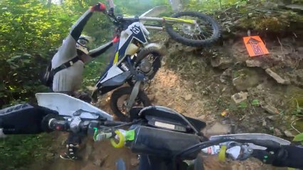 Rider Launches Bike Over Another Rider