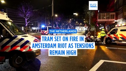 Tram set on fire in Amsterdam riot as tensions remain high