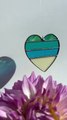 Artist is making a stained-glass heart!
