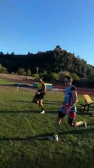 Competitors race through a 100m obstacle course when one hits his head!