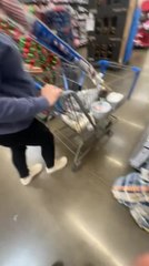 Son Playfully Pushes Mom into Grocery Display