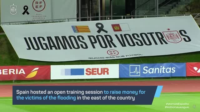Spain raise money for flood victims with open training