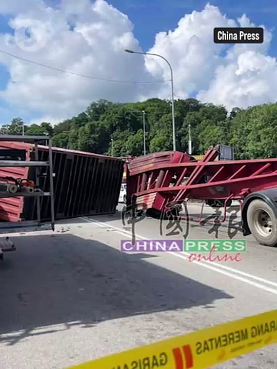 Motorist killed by falling container in Penang