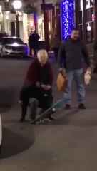 Guy Tries to Ride Skateboard With Older Lady Piggybacking on Him