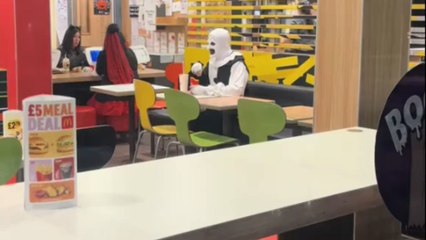 Art the Clown takes a break from causing mayhem to enjoy a McDonald's meal