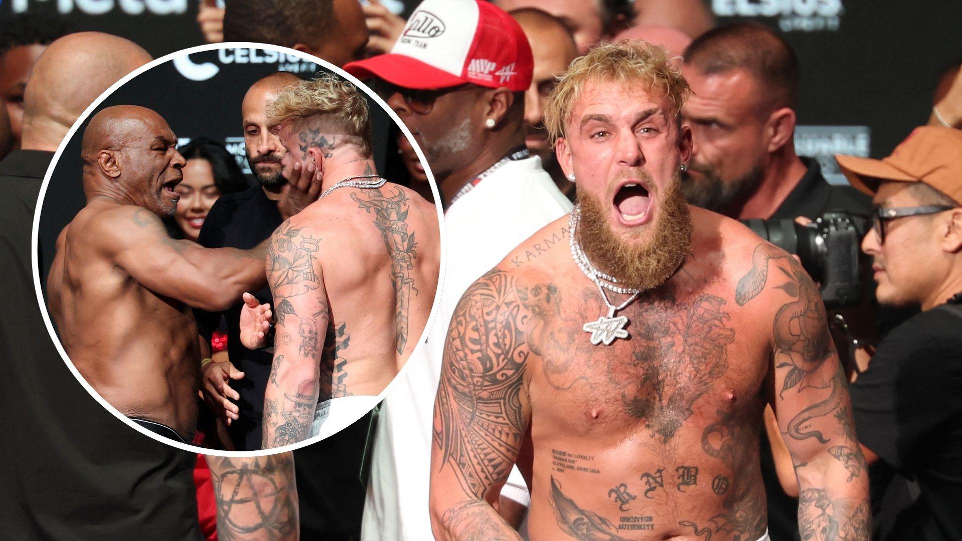 Mike Tyson slaps Jake Paul during the weigh-in ceremony