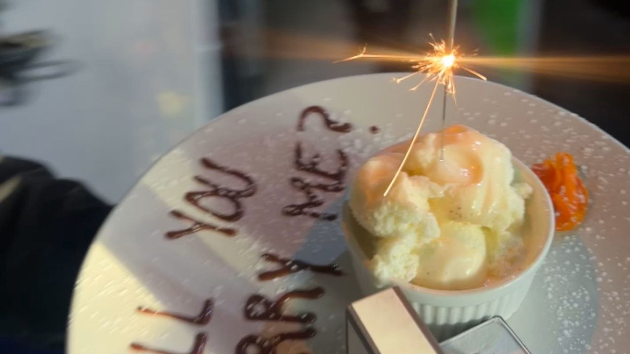 Love in the air: Boy proposes to his girlfriend with a ring at restaurant