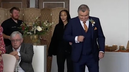 Father makes his way down aisle - but forgets the bride