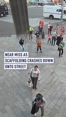 Falling scaffolding plank near-miss at busy transit hub