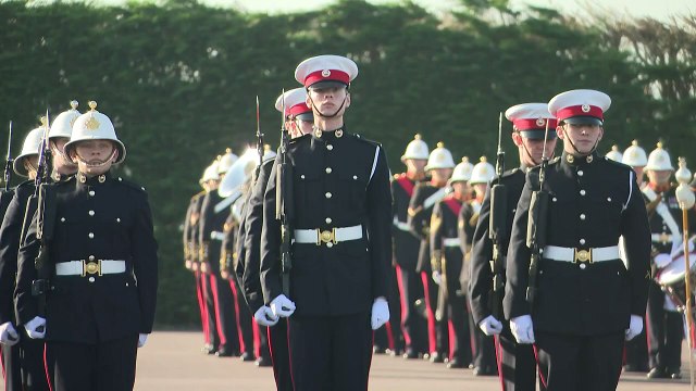 King returns to Royal Marines training base to meet recruits