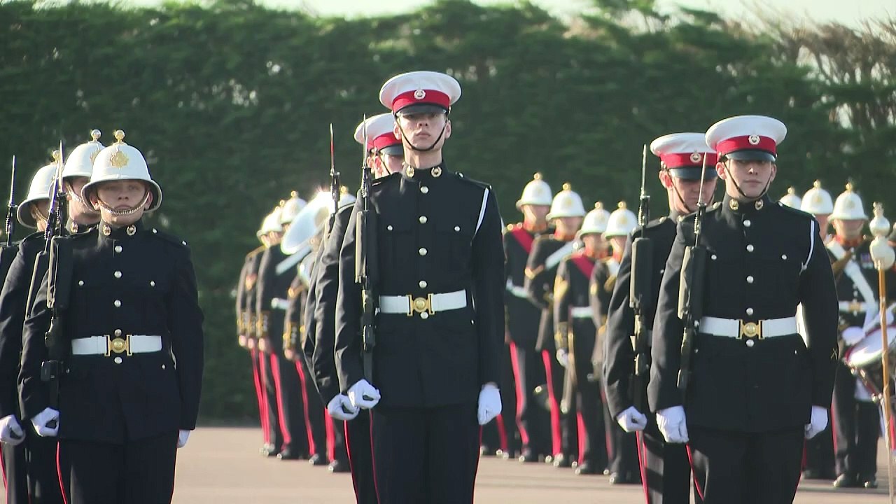 King returns to Royal Marines training base to meet recruits