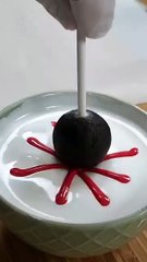 Coat cake pops with icing