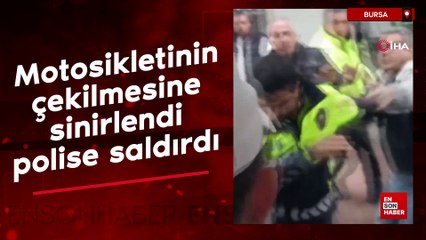 Bursa'da motosikletinin çekilmesine sinirlendi, polise saldırdı