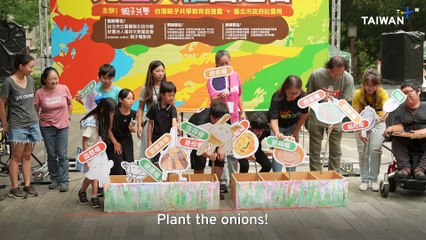 Dozens Gather In Taipei Park in Support of Children's Rights