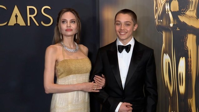 Angelina Jolie and Brad Pitt’s rarely-seen son Knox accompanies mother on red carpet at Governors Awards 2024