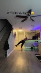 Woman Slips While Skating Indoors