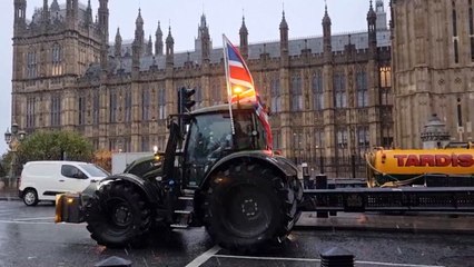 Tractors driven across Westminster Bridge ahead of the protest