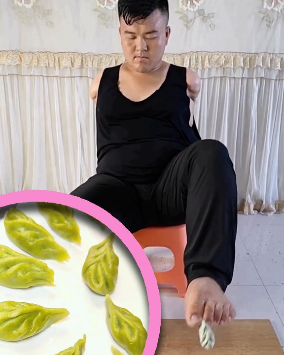 Armless man makes dumplings with his feet
