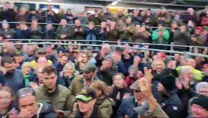 Farmers protesting in Holsworthy give a rapturous applause following a number of passionate speeches