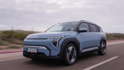Kia EV3 Baseline Frost Blue Driving in the city