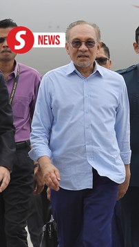 PM Anwar greeted with cheers upon arrival at KLIA after back-to-back working visits