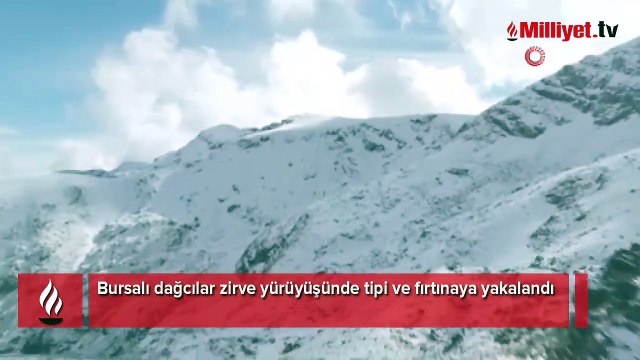 Zirveye çıkan dağcılara Uludağ'da sezonun ilk kar sürprizi