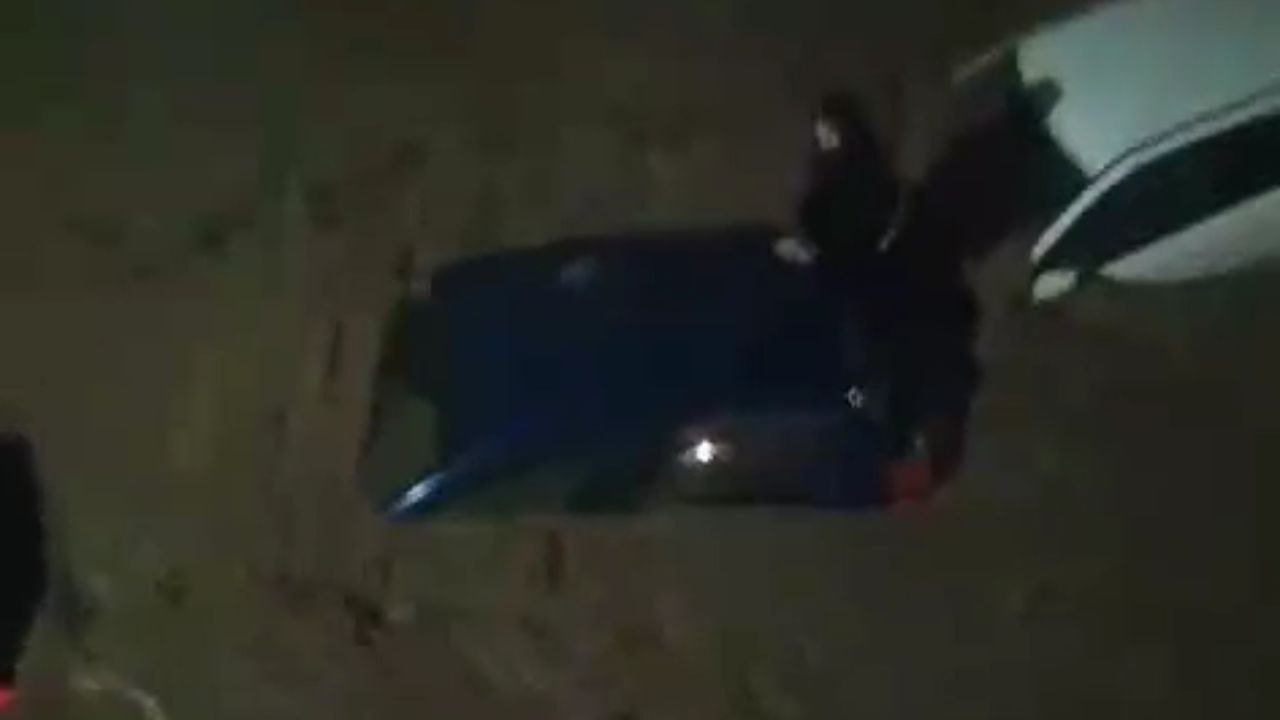 Severe flooding submerges cars on Calle Alicante in Catarroja, Spain