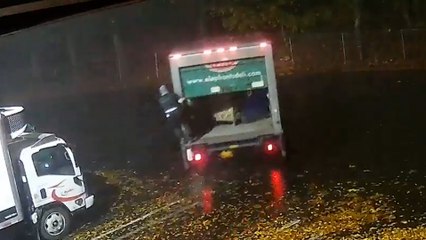 Truck stolen from warehouse parking lot with worker still inside