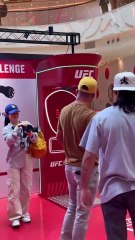 Justin and Lopes hitting the punch machine