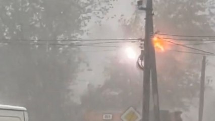 Dramatic footage of electric pole explosion amid intense rainfall