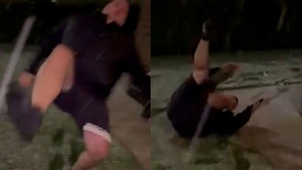 Funny moment dad tries to hit kid with snowball but topples over and lands on his back