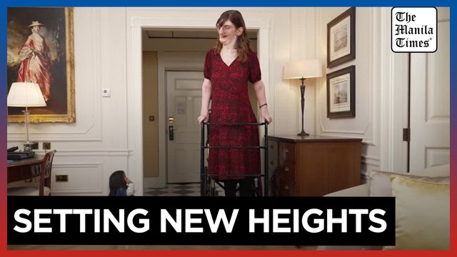 Tallest, shortest woman meet for Guinness World Records Day