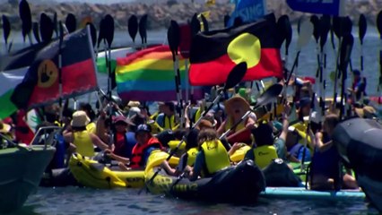 Hundreds of activists stage peaceful on-water protest in Newcastle harbour