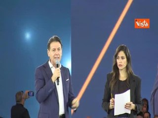 Contestatori alla Costituente dei 5 Stelle (15 persone) con Grillo e Casaleggio sulle magliette