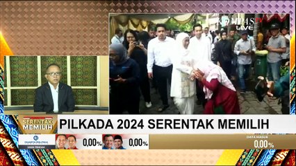 Ditemani Putranya, Khofifah Gunakan Hak Pilih di TPS 19 Margorejo Surabaya