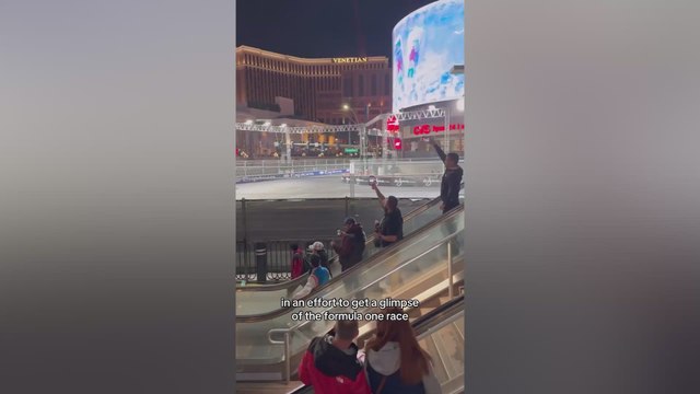 F1 fans turn mall escalators into moving grandstands to catch a glimpse of Las Vegas GP