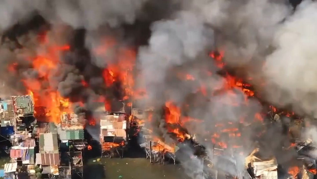 Massive fire destroys dozens of homes on Manila port