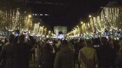 Paris' Champs Elysees glitters with Christmas lights as holiday season nears