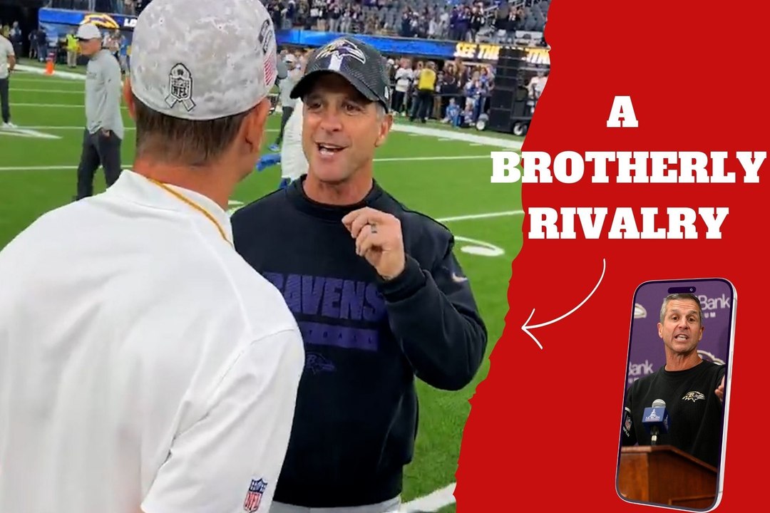 Baltimore Ravens’ head coach John Harbaugh challenges younger brother Jim to an arm wrestling match