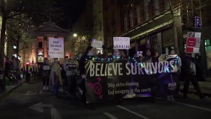 Nikita Hand supporters march through Dublin after Conor McGregor case verdict