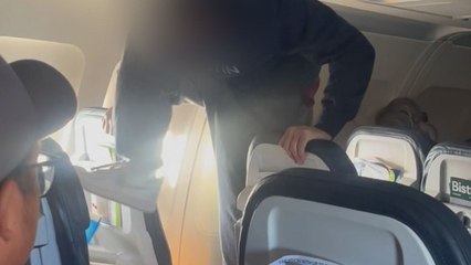 Shocking video shows man repeatedly kicking plane seat