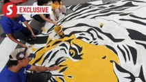 Vibrant tiger murals bring new life to Gerik